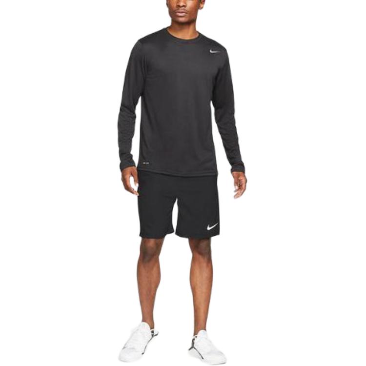 Nike Camiseta de Manga Larga y Cuello Redondo de Color Sólido con Logo para Hombre Tops Negro 727980-010