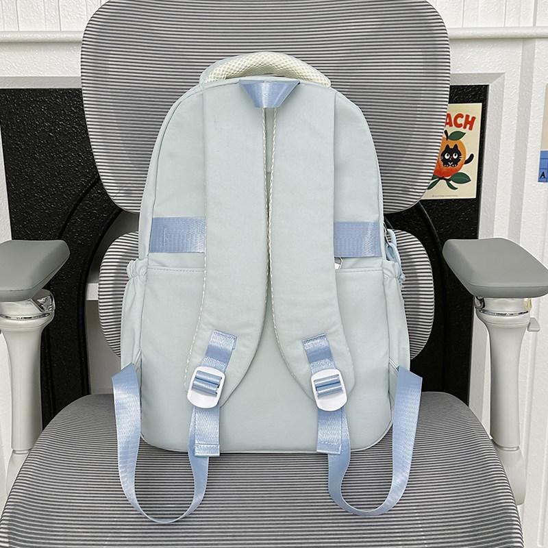 Schoolbag1011 new Korean version of female versatile primary school students 1-1 grades light spine protection campus junior high school students