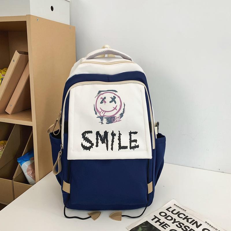 Schoolbag new student backpack casual large-capacity computer bag Korean version cute smiley face couple schoolbag manufacturer wholesale