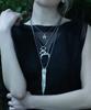 Mezmic Teeth Rolling Necklace