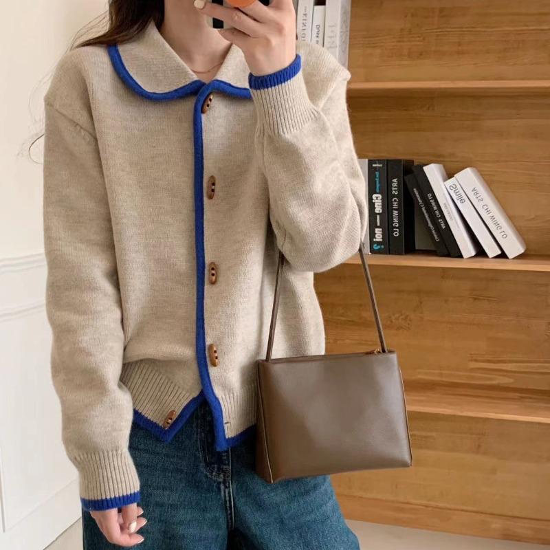 Contrasting color lapel horn buckle knitted cardigan women's autumn and winter new lazy wind loose soft waxy sweater jacket tide