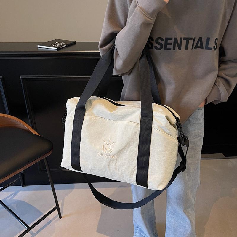 Stylish and simple going out travel bag Large capacity casual women's yoga training bag Dry and wet separation Crossbody duffel bag