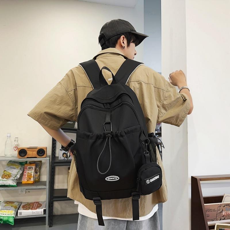 Backpack simple and fashionable college student junior high school student schoolbag female nylon large capacity leisure travel backpack male