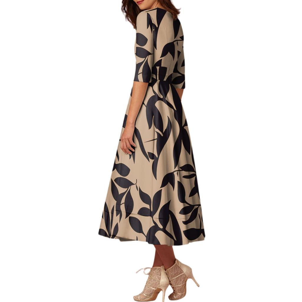 Ein modisches, mittellanges Kleid mit halblangen Ärmeln, floralen Prints und einem sexy V-Ausschnitt.