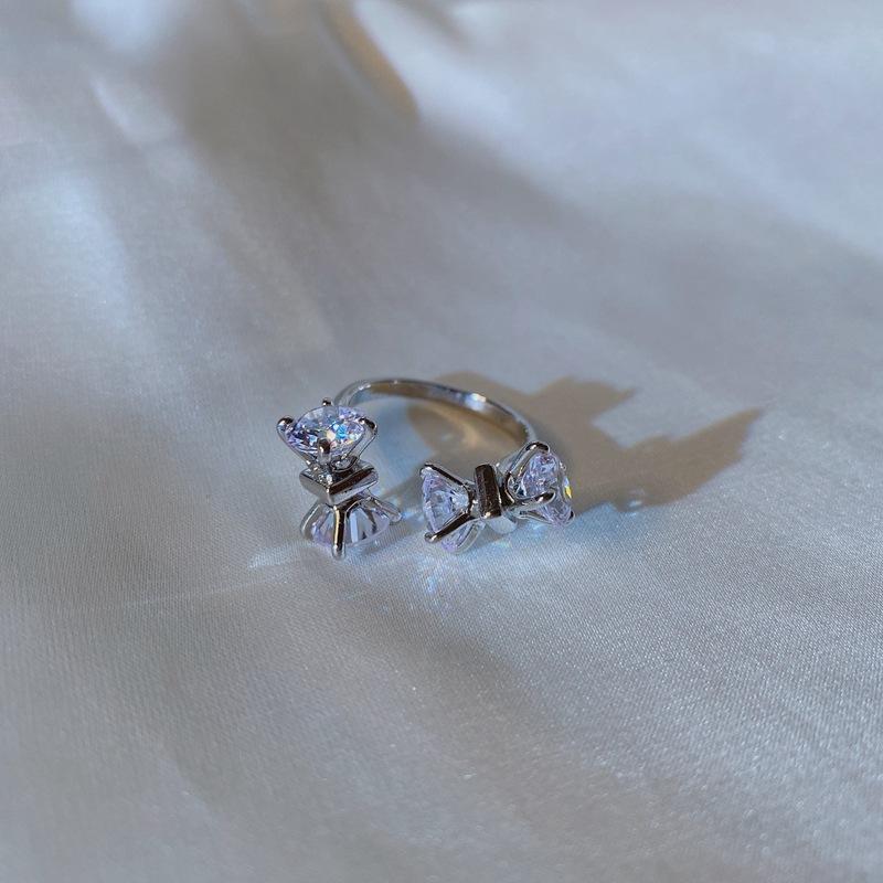 

Gentle chaebol #Simple sweet ins wind slightly inlaid zircon open bow ring Adjustable ring