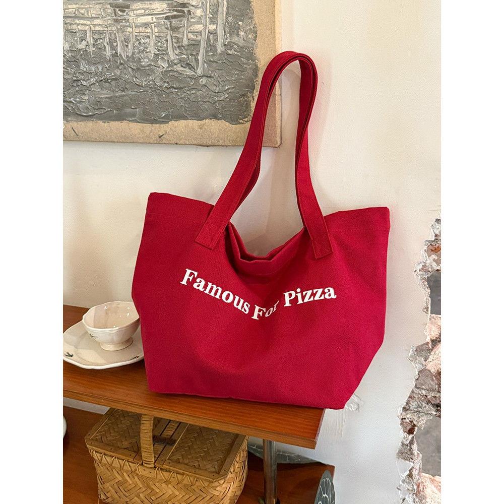 Korean large-capacity canvas bag women's new ins style letter shoulder bag casual versatile commuter tote bag