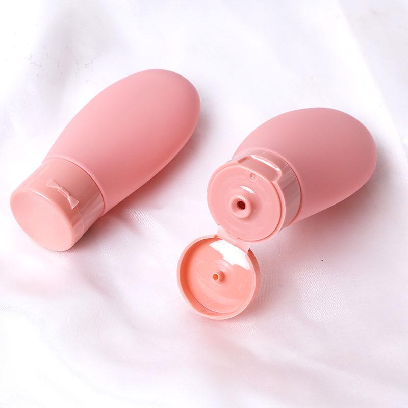 

60 мл Дорожня пляшка великої місткості з дозатором для шампуню, гелю для душу, лосьйону або мила рожевий