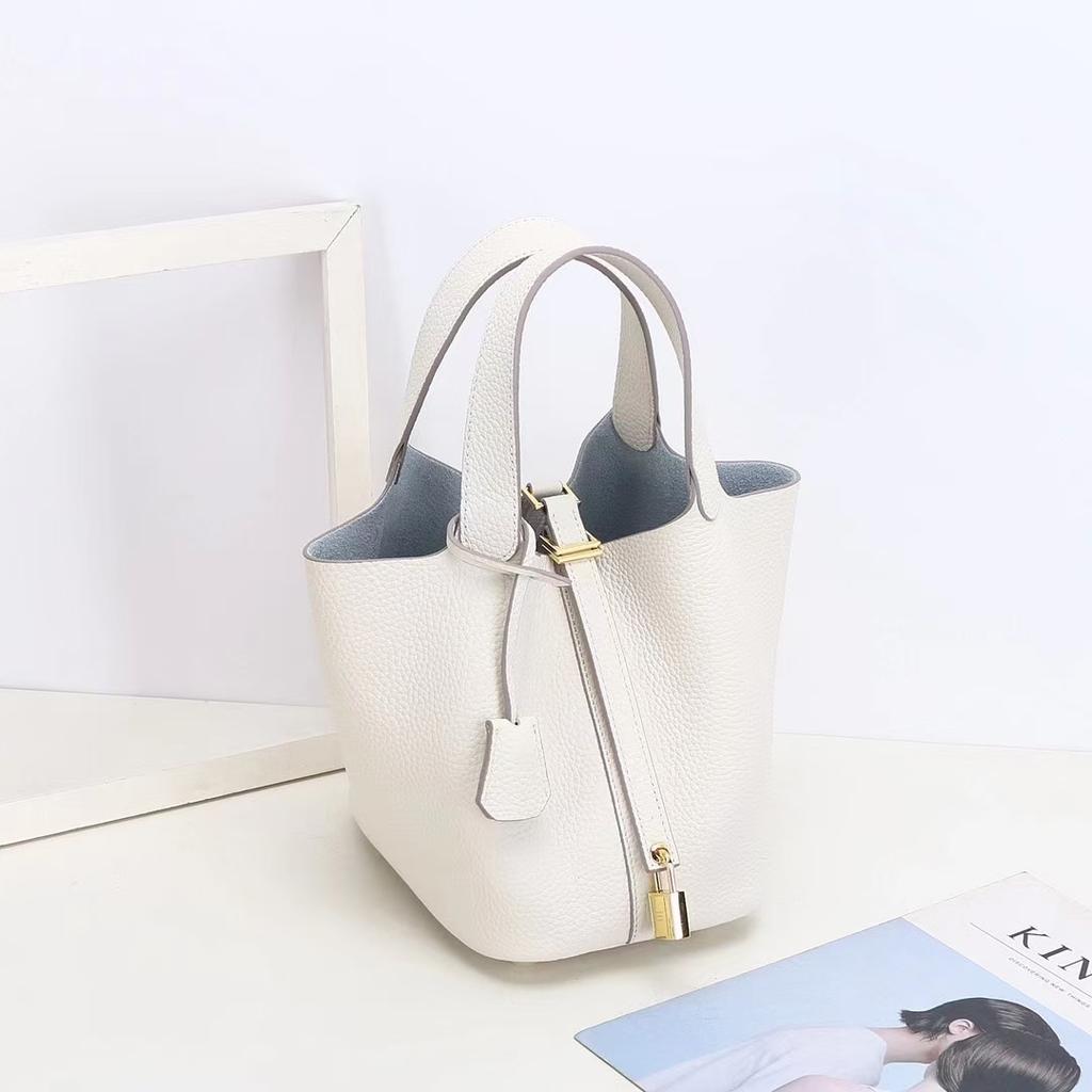 2026 new first-layer lychee pattern leather bucket bag European and American brand fashion gold buckle cowhide vegetable basket women's bag