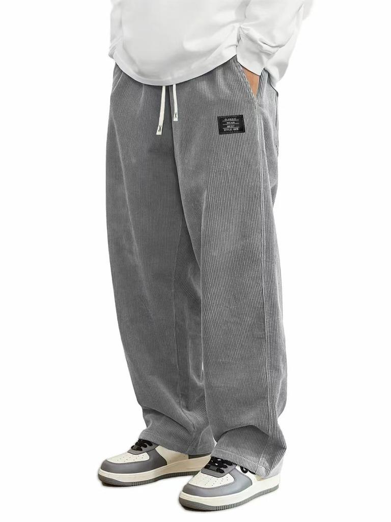 Pantaloni da uomo in velluto a coste a gamba dritta con coulisse in vita, tasche e logo, elasticizzati, vestibilità casual per l'uso quotidiano