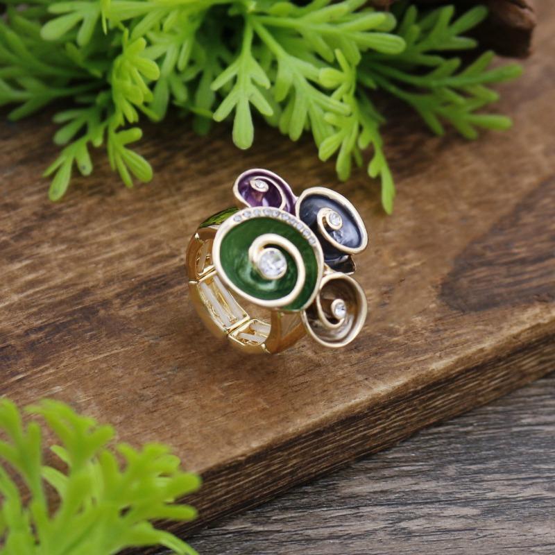 

New enamel geometric vortex flower elastic ring women s fashion high sense diamond flower ring