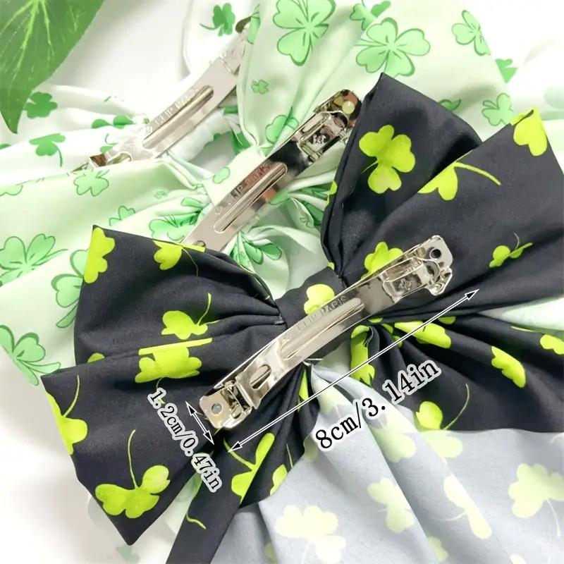 6-teiliges Set neu grün vierblättriges Kleeblatt Druck Schleifenband Streamer Federklemme Elegante Haarspange Frühling Haarschmuck