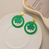 Exquisite Four-Leaf Clover Glitter Earrings: Round, Colorful, & Perfect for Parties.
