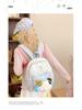 Cute Cartoon Trendy Backpack: Large Capacity, Lightweight, Versatile Travel/School Bag with Earphone and Doll Holder.