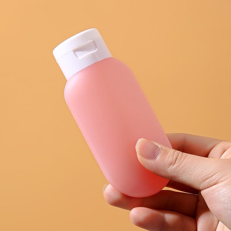 Portable 60ml Travel Dispenser Bottle for Shampoo, Shower Gel, and Facial Cleanser