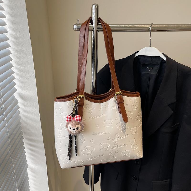 High-end contrasting color large-capacity bag women's 2025 new fashion commuter shoulder college student portable tote bag