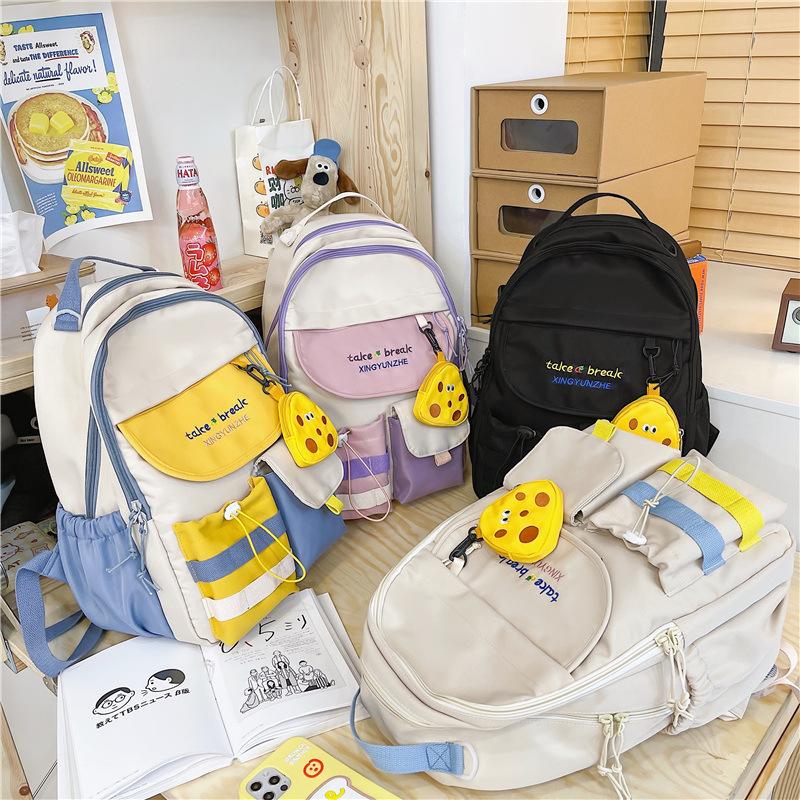 Large-capacity schoolbag female high-value junior high school college student backpack Mori style cute versatile student backpack