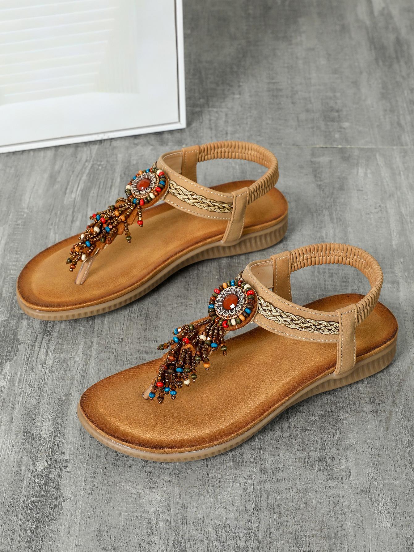 

Бохо женская обувь летние новые плоские сандалии кисточки прищемить ноги ретро повседневная обувь одна рука 43