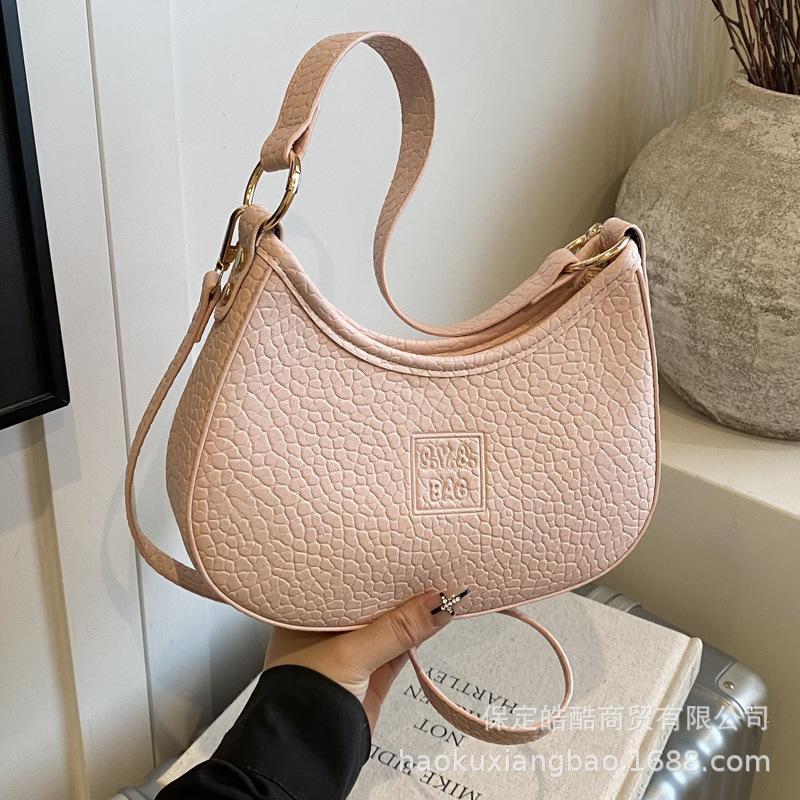Underarm bag women s fashion 2025 new niche design one shoulder messenger bag high sense foreign style hand carry dumpling bag