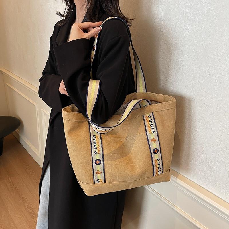 Canvas Bag Women's Large Capacity Simple 2025 New Casual Fashion Shoulder Bag for Commuting Tote Travel Bag