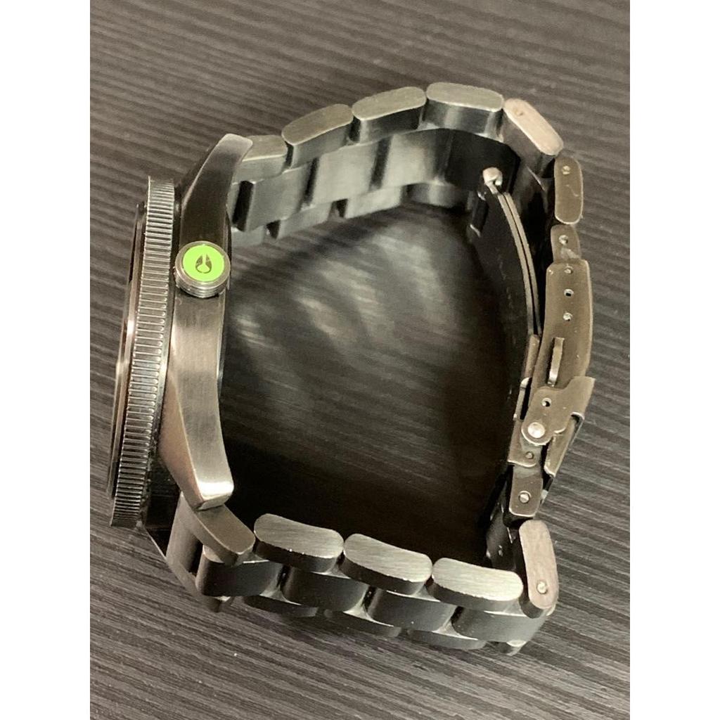 Used NIXON analog watch metallic black