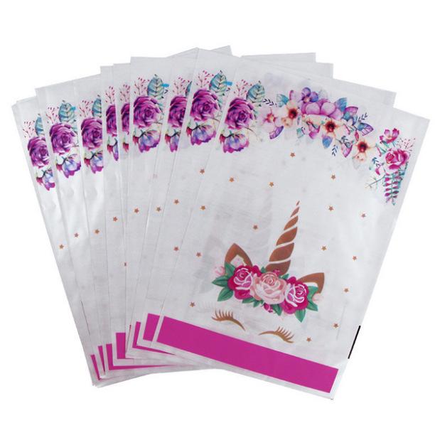 

Unicorn Party Set: Pink Paper Plates, Napkins, Cutlery, and Tablecloth for Children s Birthday Decor.