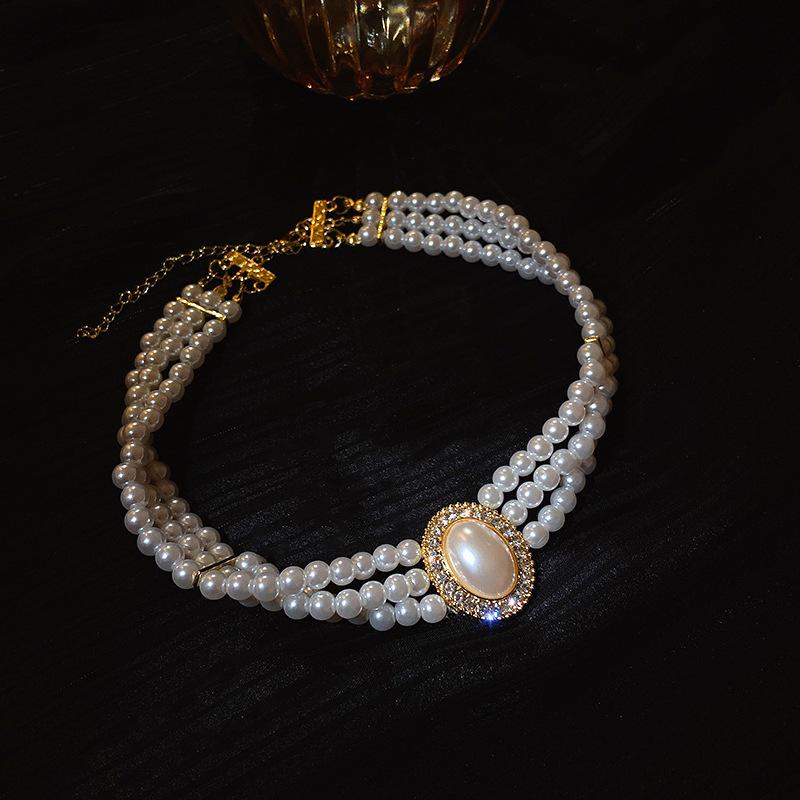 Diamantbesetzte künstliche Perle Doppelkreis Liebesohrringe Französische Retro-Steckohrringe Exquisite Ohrringe Damen