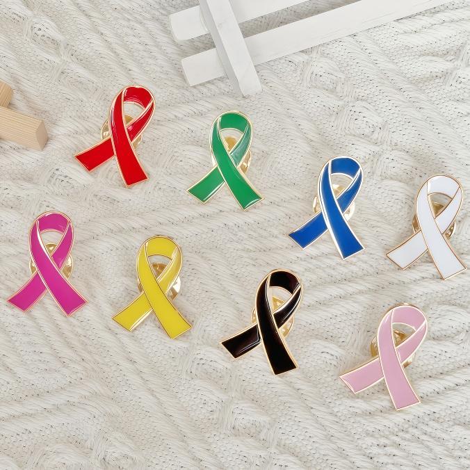Spilla a forma di cuore con nastro rosso - Sensibilizzazione e Promozione sull'AIDS