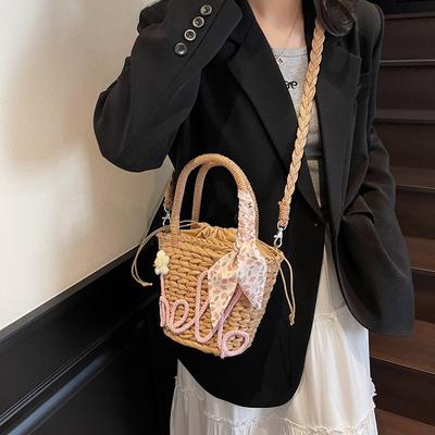 Hand Carrying Seaside Vacation Leisure Bag Women's Spring and Summer Simple Leisure Straw Woven Bucket Bag Texture Messenger Bag