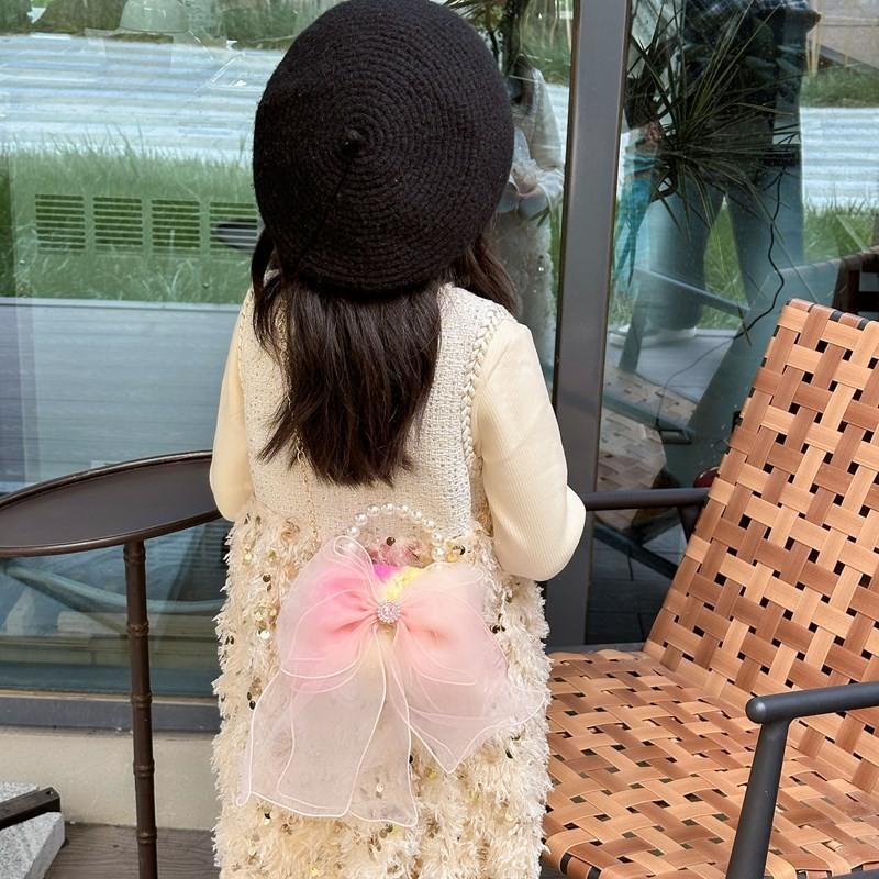 Lovely And Eye-catching Pearl Handled Bowknot Purse For Kids In Soft Pink For Daily Wear