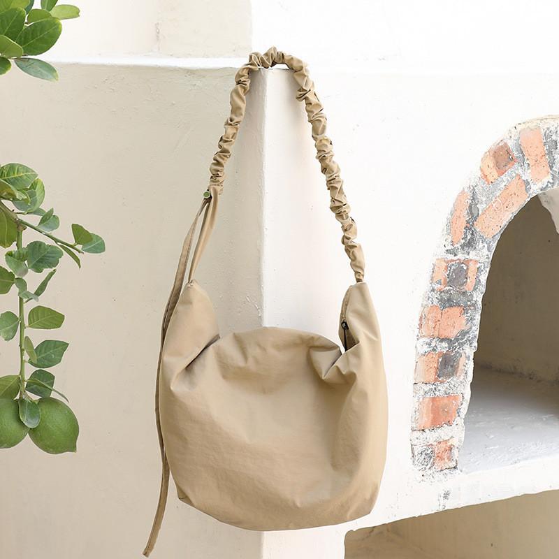 IELGY Japanese Casual Literary Canvas Bag, Fashionable Drawstring Shoulder Pleated Nylon Messenger Bag