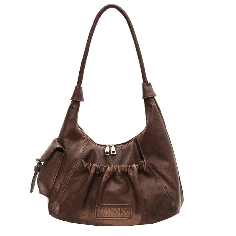 Niche high-end sense retro Spice Girl underarm bag women 2025 new Maillard style shoulder bag pleated dumpling bag