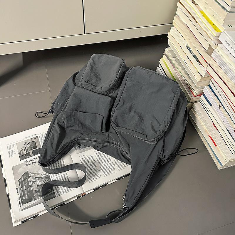 Crossbody bag Women's Japanese simple and lightweight neutral messenger bag Solid color sports and leisure shoulder bag Lightweight student backpack