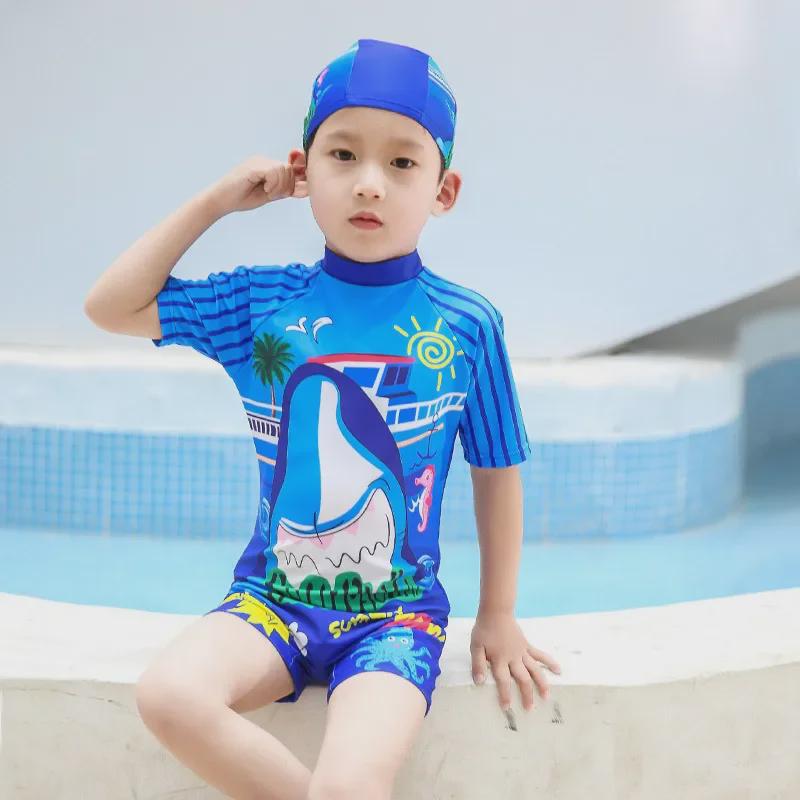 Kids' One-Piece Shark Swimsuit with Swim Cap - Korean Style, Quick-Dry, UV Protection for Boys In Small, Medium, and Large.