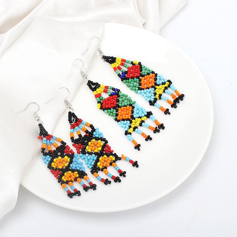 European and American ethnic style handmade rice bead fringed earrings, niche design sense vintage retro earrings