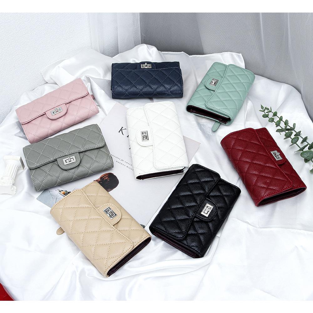 Cartera corta de cuero de lujo ligero para mujer, nueva de 2025, plegable de tres pliegues, billetera corta de piel de vaca caviar, espacio para múltiples tarjetas