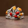A retro inlaid two-color artificial gemstone ring made of copper, suitable for both daily wear and date occasions.