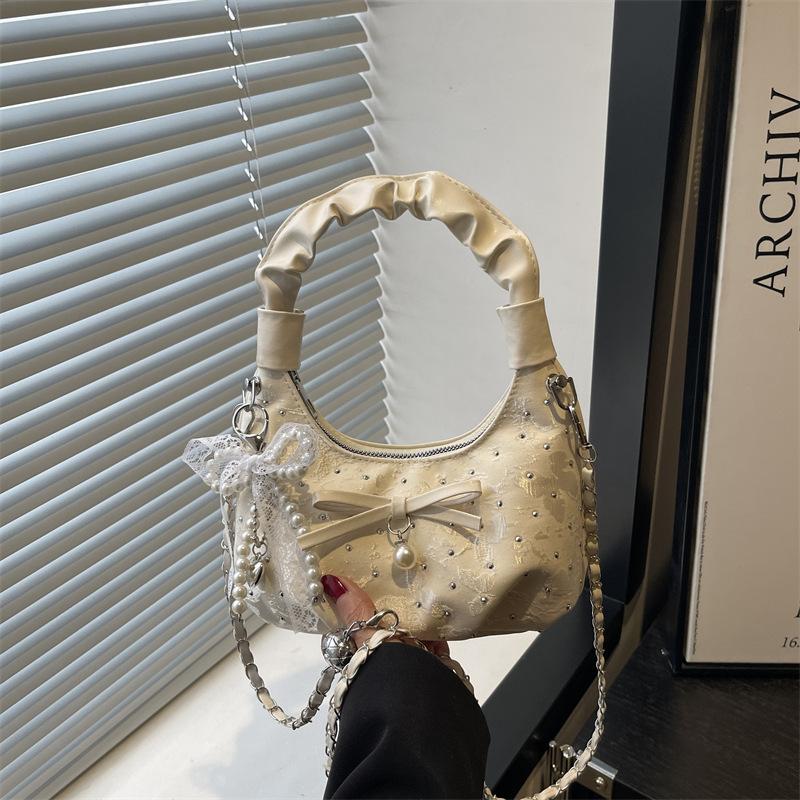 

Fashion and popular high-end sense diamond-encrusted bag women s winter new cute shoulder oblique span bag Without pendant шампанського