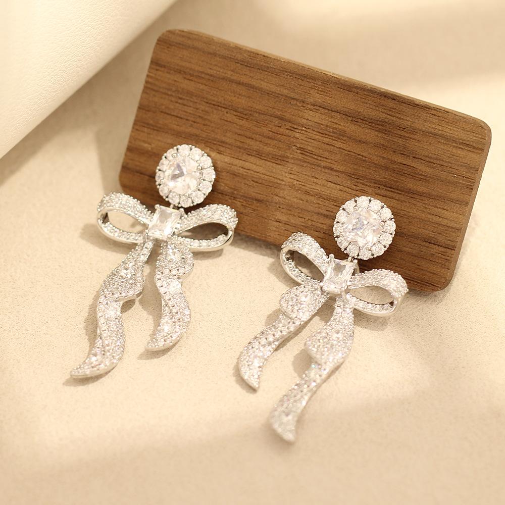 Light luxury niche pink and blue bow earrings, gold-plated temperament versatile 925 silver needle stud earrings, women's models