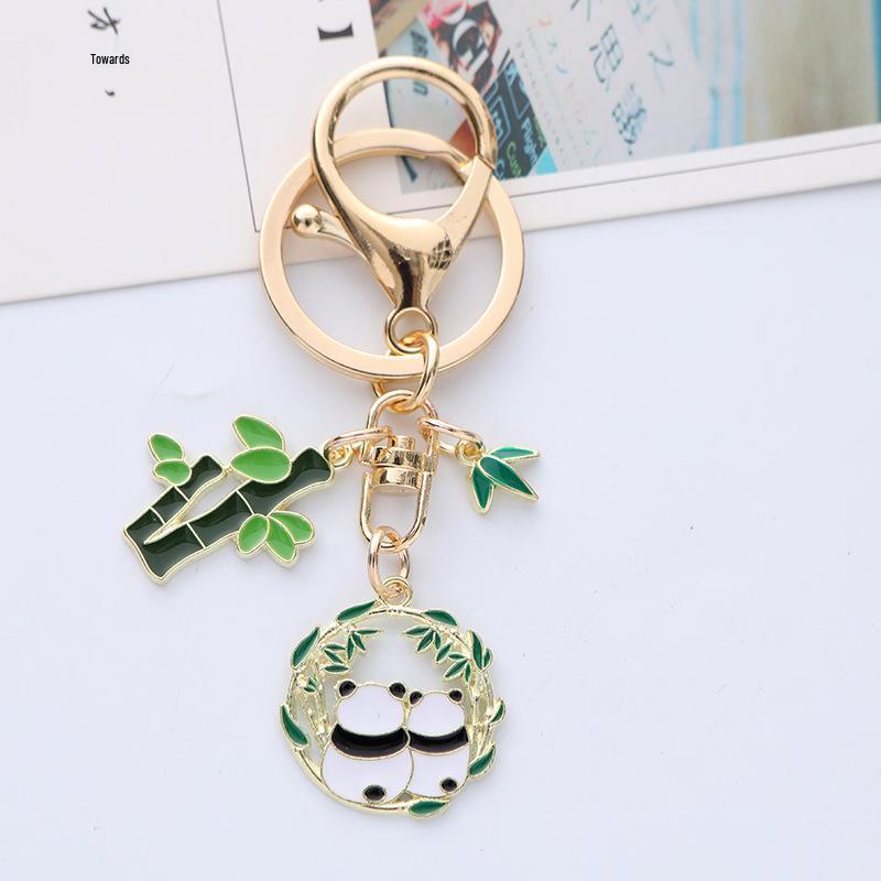 Quirky Cartoon Panda Alloy Keychain Pendant with Cute Bamboo Leaf Design - Earphone Case & Bag Decoration
