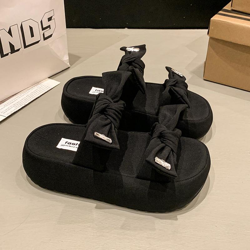 

Increase the height and step on shit beach shoes to drag women to wear 2025 versatile new models, one word summer outer bow thick-soled slippers women 40 чёрный