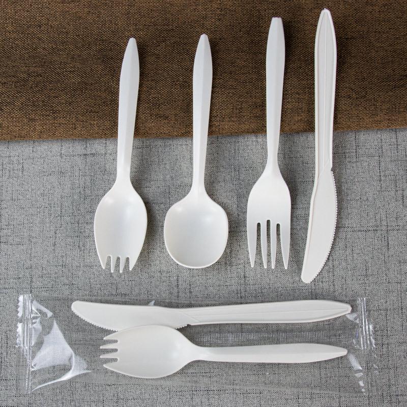 Eco-Friendly Disposable Starch Cutlery Set: Knife, Fork, Spoon - Individually Packaged 3-Piece Customizable Set.