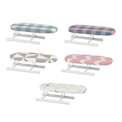 Mini tabla de planchar plegable con patas plegables, estante de planchado portátil para ropa del hogar, suministros para el hogar, cubierta de planchado resistente al calor