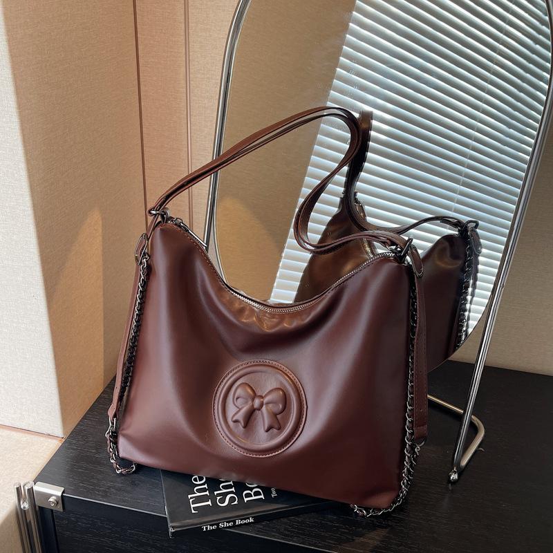 

Retro large-capacity tote bag women s new versatile casual shoulder messenger bag backpack темно-коричневого