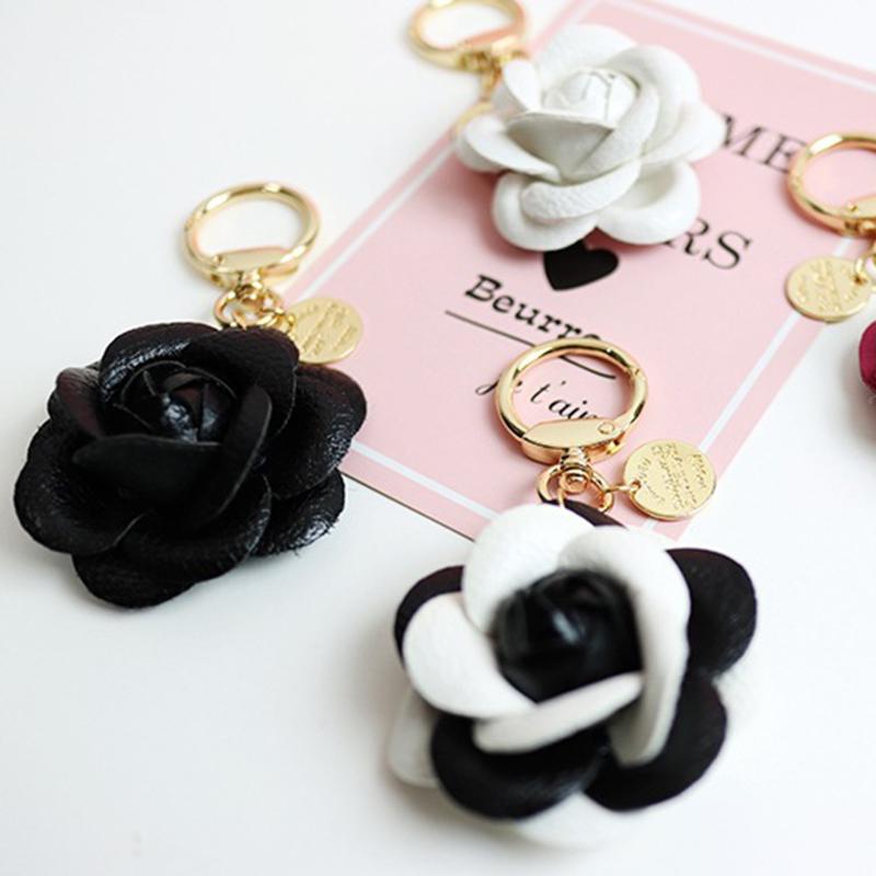 Yogodlns Cute Sweet Synthetic PU Leather Rose Camellia Flowers Bag Pendant For Women Trinket Key Chains Ring Car Bag Charm
