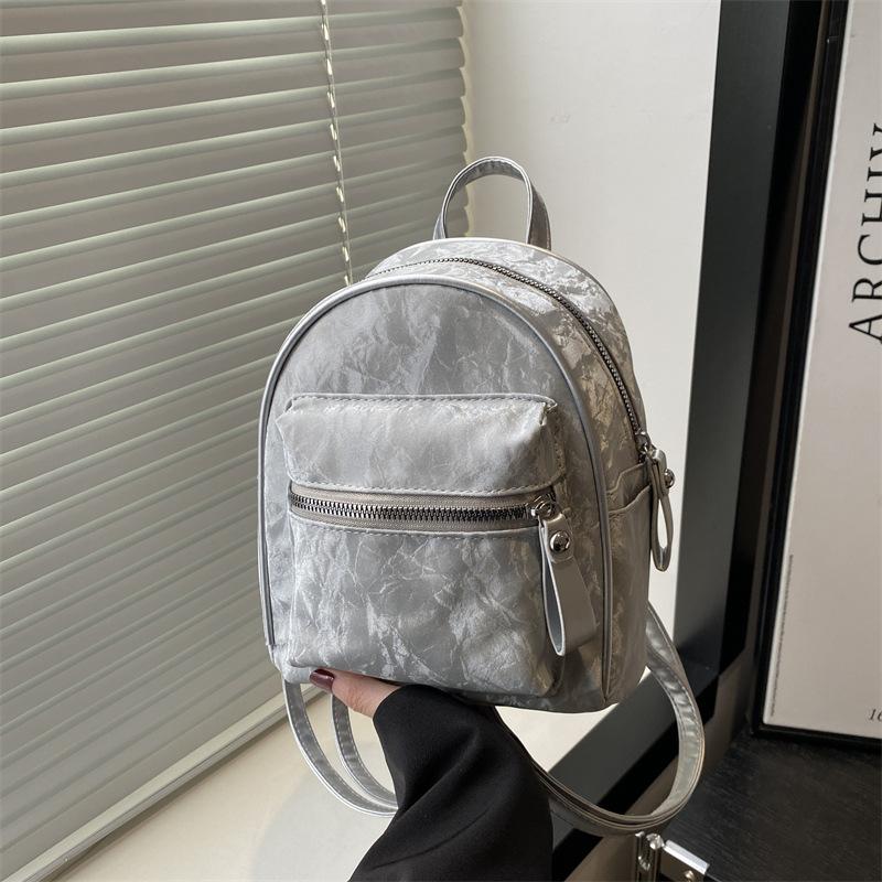 Schoolbag Korean version of simple small bag women's 1011 fashion new small backpack casual simple texture commuter travel backpack