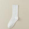 For Women, There Are Boneless and Non-uncomfortable Mid-calf Socks. Pull A Solid-colored Cotton Long Calf Sock That Is Breathable
