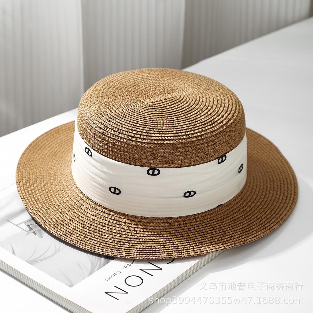 Straw hat women's summer sunshade sunscreen temperament flat top top hat Internet celebrity seaside Hepburn style straw beach hat