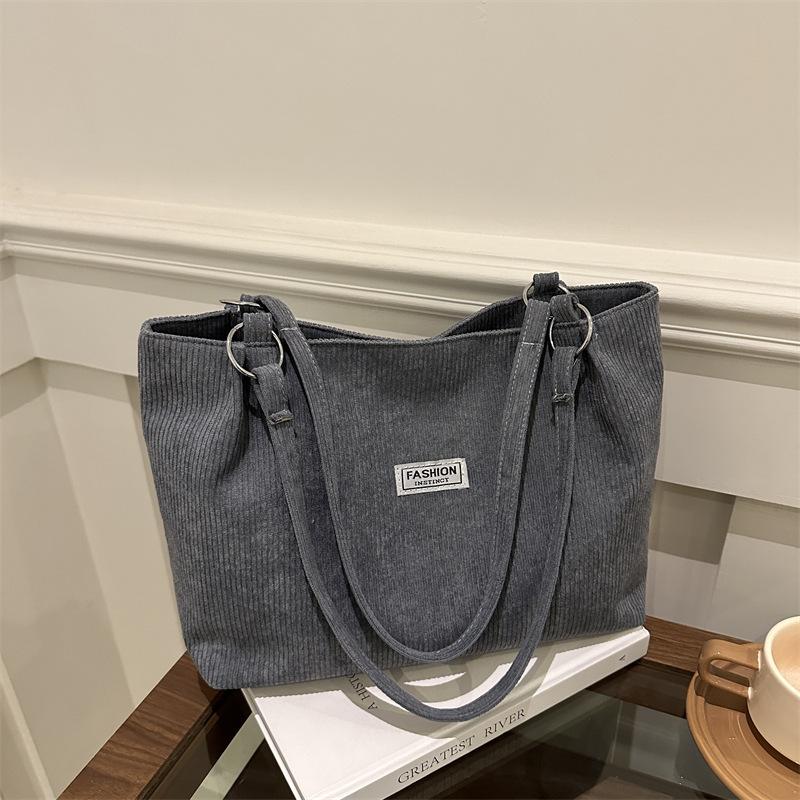 Corduroy bag women's large capacity 2025 new autumn and winter versatile casual shoulder shopping bag commuter tote bag
