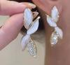 Korean temperament super fairy versatile leaf stud earrings flash diamond leaves long Shu light luxury earrings