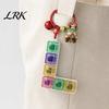 Trendy Bag Charm for Teenagers Christmas Mechanical Keyboard Fidget Keychain, Push Button Stress Relief Desktop Decompression Gadget Toy with Reindeer